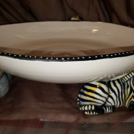 pottery animal footed bowl